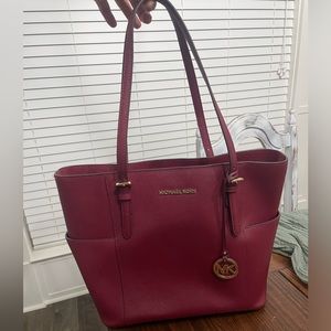 Burgundy Michael Kors tote bag
